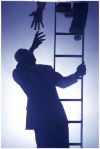 People climbing a ladder image